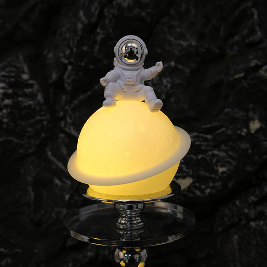 Astronaut Sitting on The Moon Light